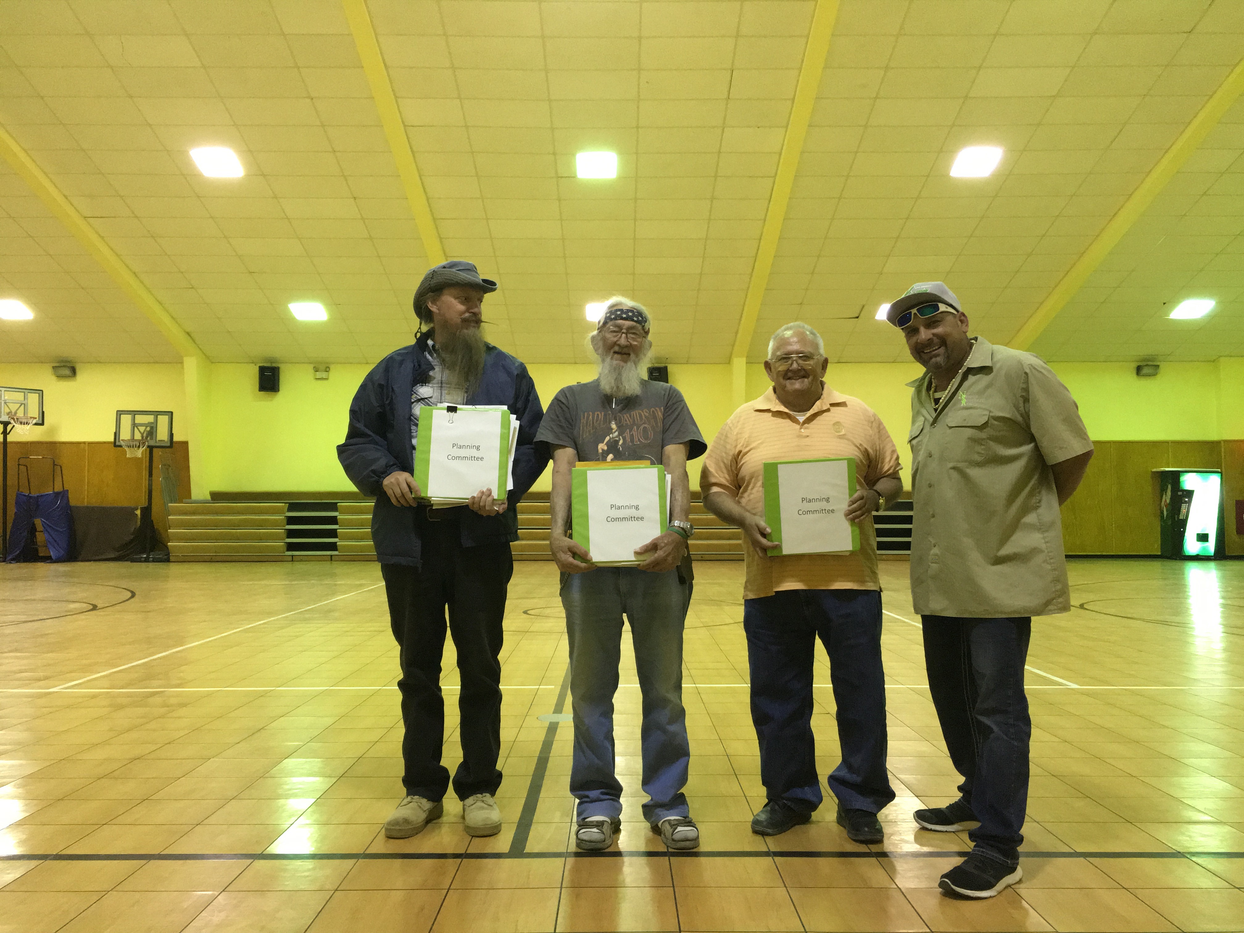 Amargosa Valley Planning Committee members holding meeting binders